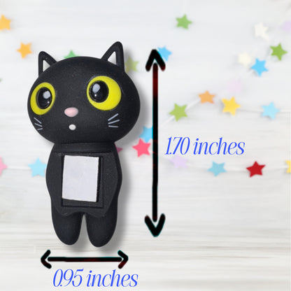 Black cat-shaped toy with measurements on a white background with colorful stars. measurements  are 1.70 inches on height and .95 inches wide