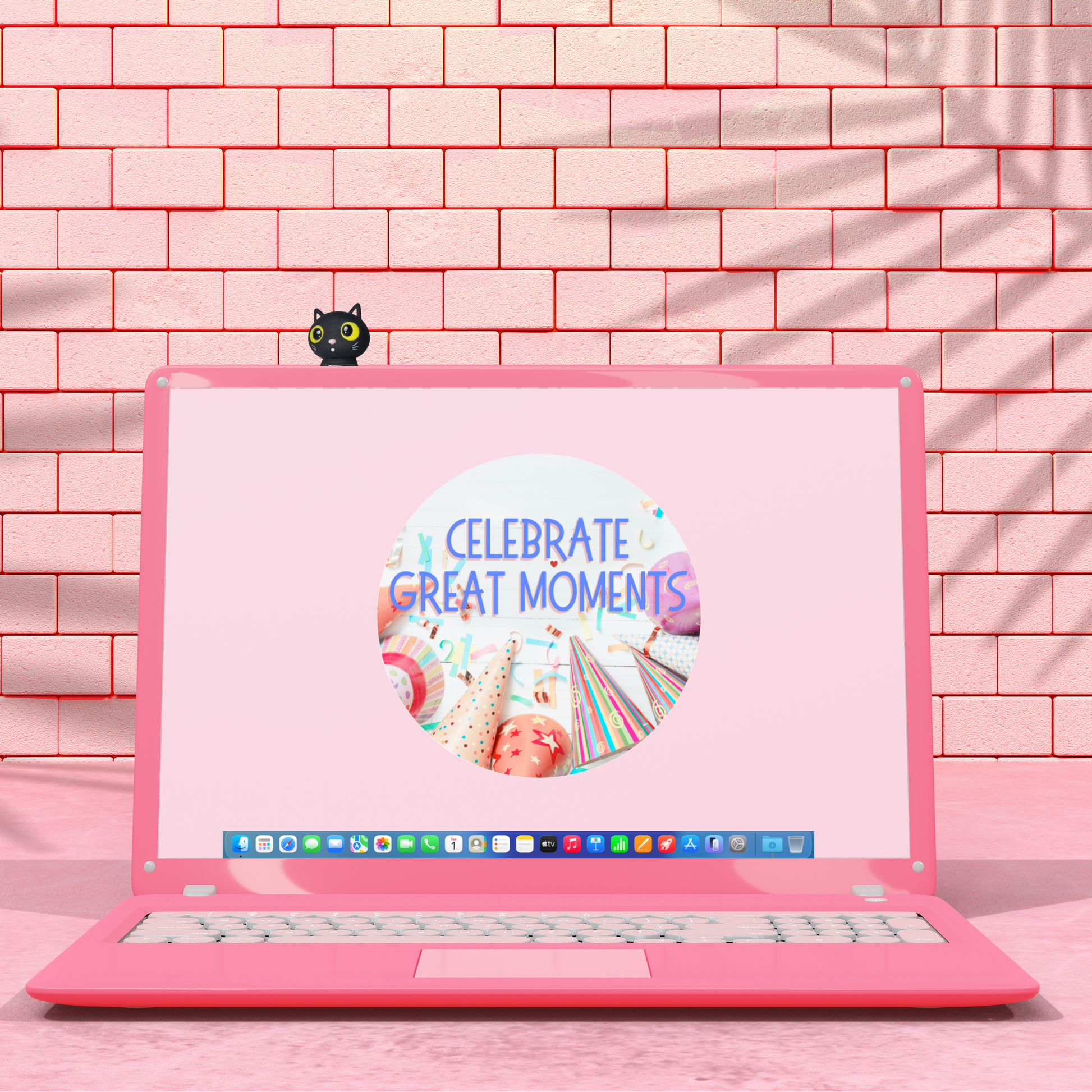 Pink laptop with a sticker on a pink brick wall background with a Black cat figurine with yellow eyes 