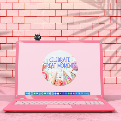 Pink laptop with a sticker on a pink brick wall background with a Black cat figurine with yellow eyes 